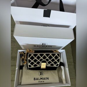 Balmain Black and Gold Clutch with Chain Details